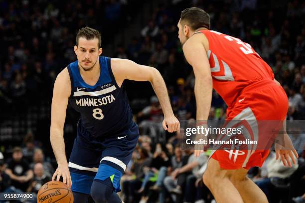 Nemanja Bjelica of the Minnesota Timberwolves dribbles the ball against Ryan Anderson of the Houston Rockets in Game Four of Round One of the 2018...