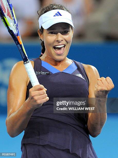 Ana Ivanovic of Serbia celebrates winning her match against Timea Bacsinszky of Switzerland at the Brisbane International tennis tournament, in...