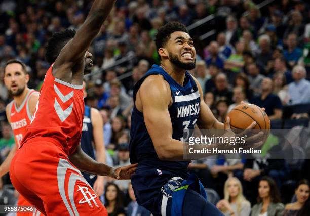 Karl-Anthony Towns of the Minnesota Timberwolves shoots the ball against Clint Capela of the Houston Rockets in Game Four of Round One of the 2018...