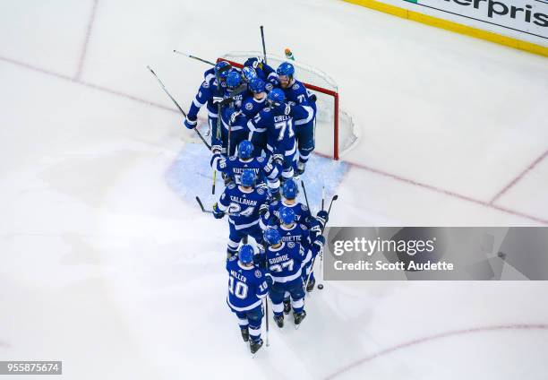 The Tampa Bay Lightning celebrate the series win against the Boston Bruins during Game Five of the Eastern Conference Second Round during the 2018...