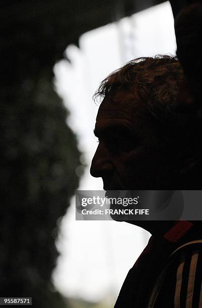 France national football team coach Raymond Domenech answers journalists' questions during a press conference, on October 9, 2009 in Perros-Guirec,...