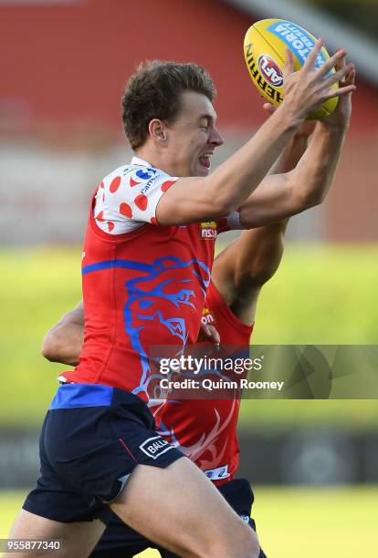 Jackson Macrae of the Bulldogs marks during a Western Bulldogs AFL training session at Whitten Oval on May 8, 2018 in Melbourne, Australia.