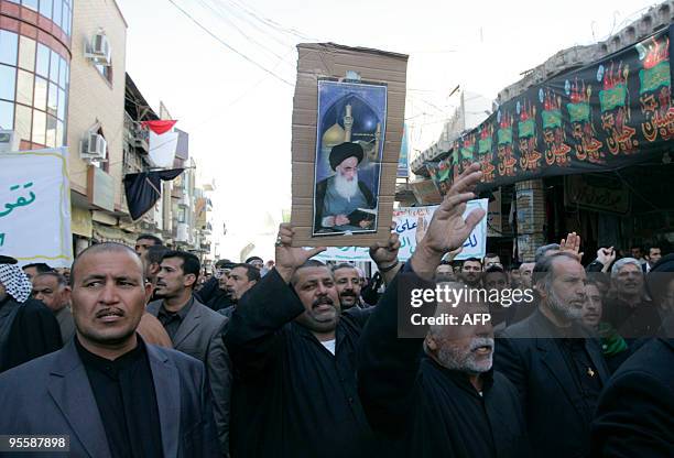 Some 500 Shiite Muslims protest through the streets of the southern city of Najaf 150 kms from the capital Baghdad on January 05, 2010. The men took...