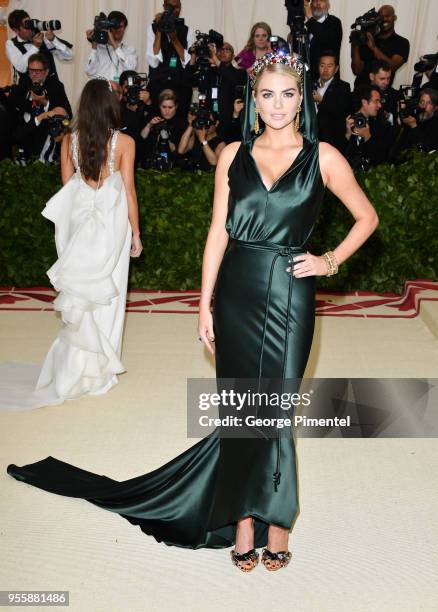 Kate Upton attends the Heavenly Bodies: Fashion & The Catholic Imagination Costume Institute Gala at Metropolitan Museum of Art on May 7, 2018 in New...