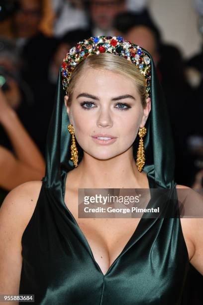 Kate Upton attends the Heavenly Bodies: Fashion & The Catholic Imagination Costume Institute Gala at Metropolitan Museum of Art on May 7, 2018 in New...