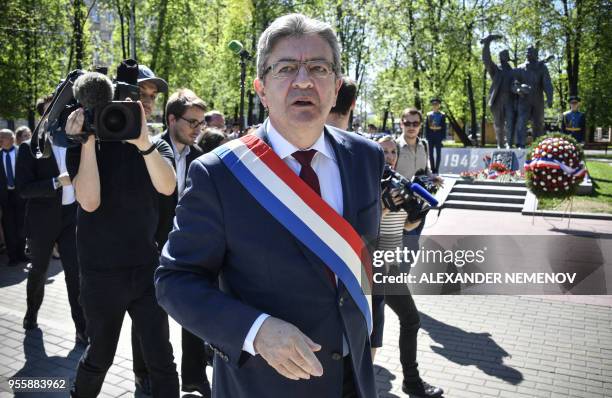 French member of Parliament and leader of the far-left La France Insoumise party Jean-Luc Melenchon visits a monument to France's WWII...