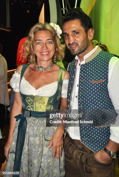 Emese Hunyady and Fadi Merza pose during the Pro Juventute Charity Fashion Show on May 7, 2018 in Vienna, Austria.