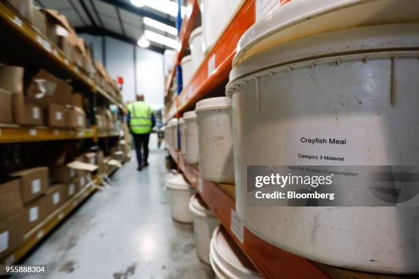 Tubs of fishing bait sit on shelving at the C.C. Moore and Co. Ltd. Fishing bait manufacturing plant in Stalbridge, U.K., on Monday, April 23, 2018....