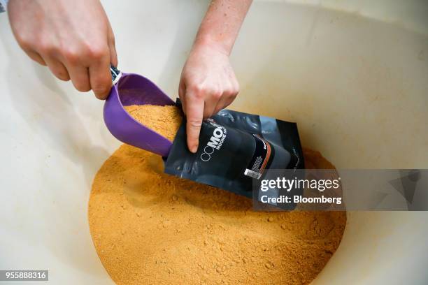 An employee packs fishing bait at the C.C. Moore and Co. Ltd. Fishing bait manufacturing plant in Stalbridge, U.K., on Monday, April 23, 2018. All...