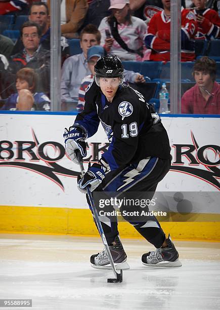 Stephane Veilleux of the Tampa Bay Lightning controls the puck against the Montreal Canadiens at the St. Pete Times Forum on December 30, 2009 in...