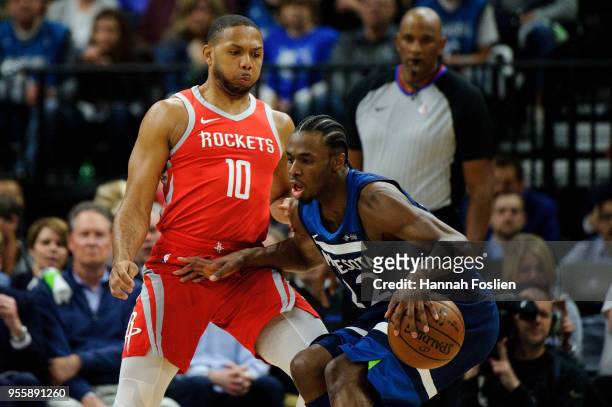 Eric Gordon of the Houston Rockets defends against Andrew Wiggins of the Minnesota Timberwolves in Game Three of Round One of the 2018 NBA Playoffs...