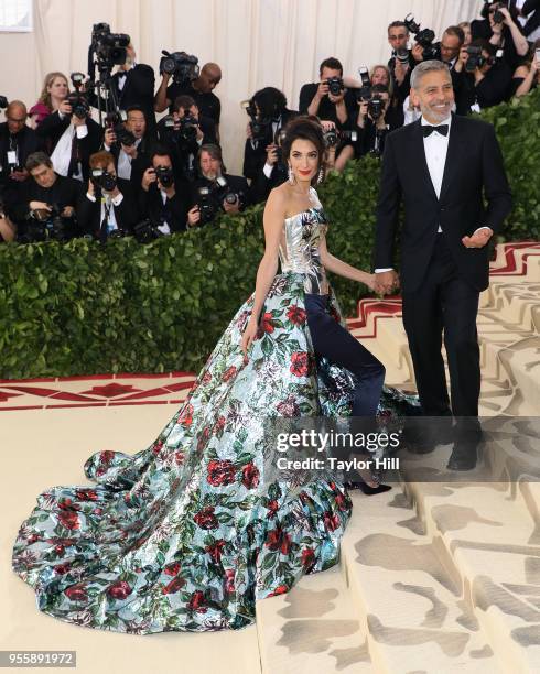 Amal Clooney and George Clooney attend "Heavenly Bodies: Fashion & the Catholic Imagination", the 2018 Costume Institute Benefit at Metropolitan...