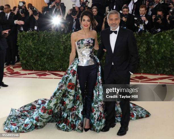 Amal Clooney and George Clooney attend "Heavenly Bodies: Fashion & the Catholic Imagination", the 2018 Costume Institute Benefit at Metropolitan...