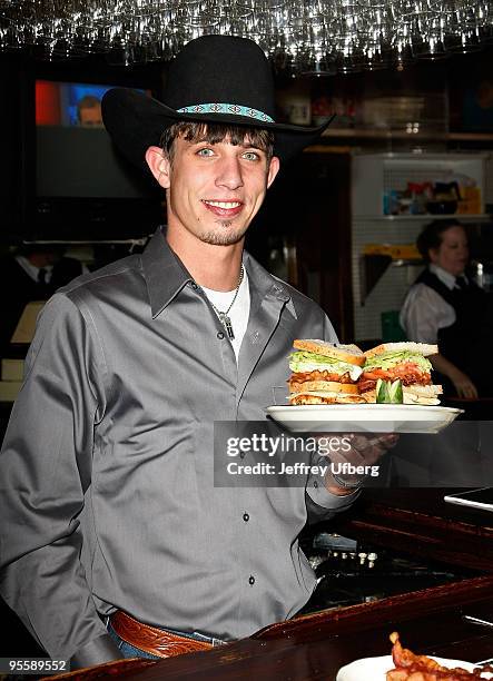 S 2009 World Champ runner up J.B. Mauney unveils the PBR Bull Bucking Hero at the Stage Deli on January 5, 2010 in New York City.