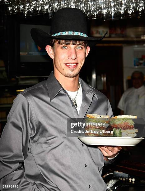 S 2009 World Champ runner up J.B. Mauney unveils the PBR Bull Bucking Hero at the Stage Deli on January 5, 2010 in New York City.