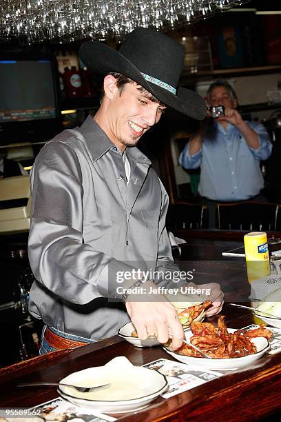 S 2009 World Champ runner up J.B. Mauney unveils the PBR Bull Bucking Hero at the Stage Deli on January 5, 2010 in New York City.