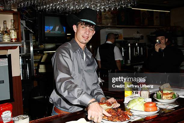 S 2009 World Champ runner up J.B. Mauney unveils the PBR Bull Bucking Hero at the Stage Deli on January 5, 2010 in New York City.