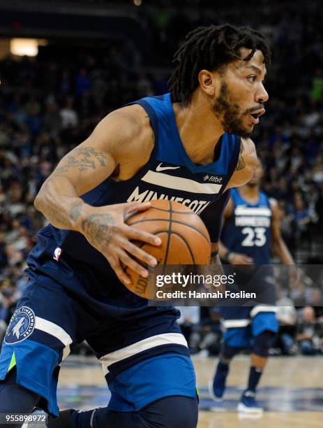 Derrick Rose of the Minnesota Timberwolves drives to the basket against the Houston Rockets in Game Three of Round One of the 2018 NBA Playoffs on...