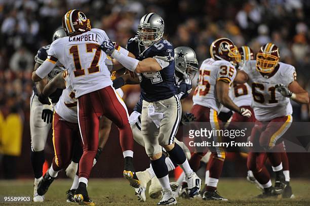 Bobby Carpenter of the Dallas Cowboys defends against the Washington Redskins at FedExField on December 27, 2009 in Landover, Maryland. The Cowboys...