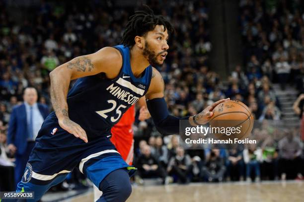 Derrick Rose of the Minnesota Timberwolves drives to the basket against the Houston Rockets in Game Three of Round One of the 2018 NBA Playoffs on...