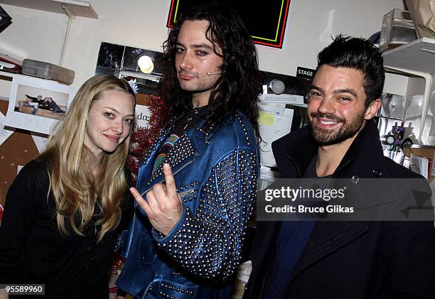 Amanda Seyfried, Constantine Maroulis and Dominic Cooper pose backstage at the hit rock musical "Rock of Ages" on Broadway at The Brooks Atkinson...