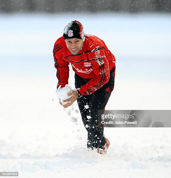 Javier Mascherano plays in the snow during a training session at Melwood Training Ground on January 5, 2010 in Liverpool, England.