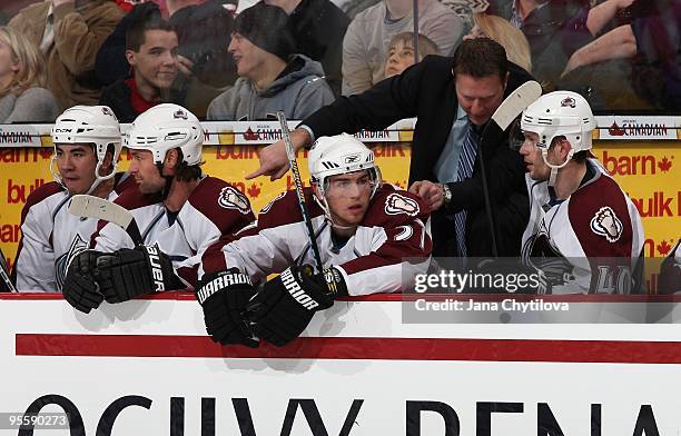 Head Coach Joe Sacco talks to Ryan O'Reilly and Marek Svatos of the Colorado Avalanche in a game against the Ottawa Senators at Scotiabank Place on...