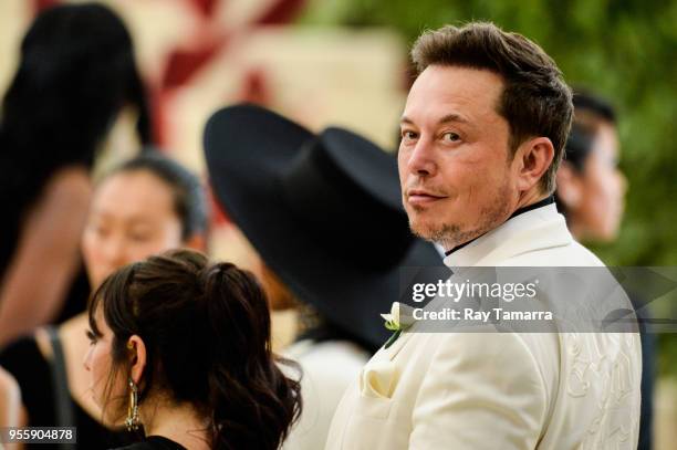 Business magnate Elon Musk enters the Heavenly Bodies: Fashion & The Catholic Imagination Costume Institute Gala at The Metropolitan Museum on May...