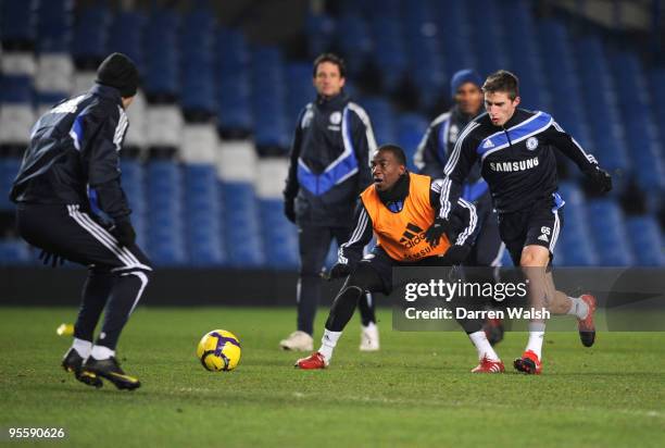 Gael Kakuta and Fabio Borini of Chelsea in action during a training session at Stamford Bridge on January 5, 2010 in London, England.