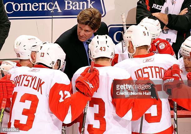 Head Coach Mike Babcock of the Detroit Red Wings talks to his players during a time out against the Phoenix Coyotes on January 2, 2010 at Jobing.com...
