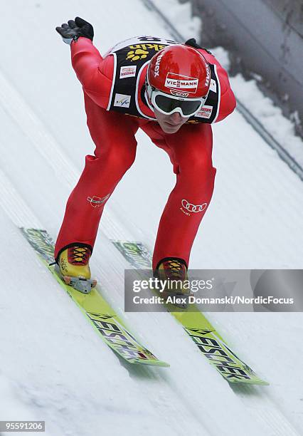 Michael Uhrmann of Germany competes during the FIS Ski Jumping World Cup event of the 58th Four Hills Ski Jumping Tournament on January 05, 2010 in...