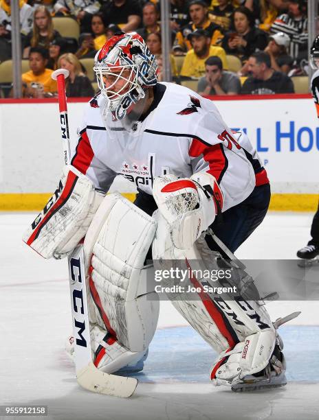 Braden Holtby of the Washington Capitals defends the net against the Pittsburgh Penguins in Game Three of the Eastern Conference Second Round during...