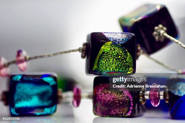 square dichroic glass beads close-up - murano 個照片及圖片檔