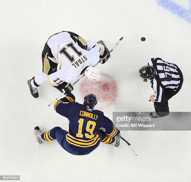 Jordan Staal of the Pittsburgh Penguins takes a faceoff against Tim Connolly of the Buffalo Sabres on December 29, 2009 at HSBC Arena in Buffalo, New...