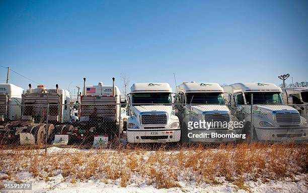 Arrow Trucking Co. Tractors are stored on a lot near a Freightliner dealership in Tulsa, Oklahoma, U.S., on Monday, Jan. 4, 2010. Arrow Trucking Co.,...