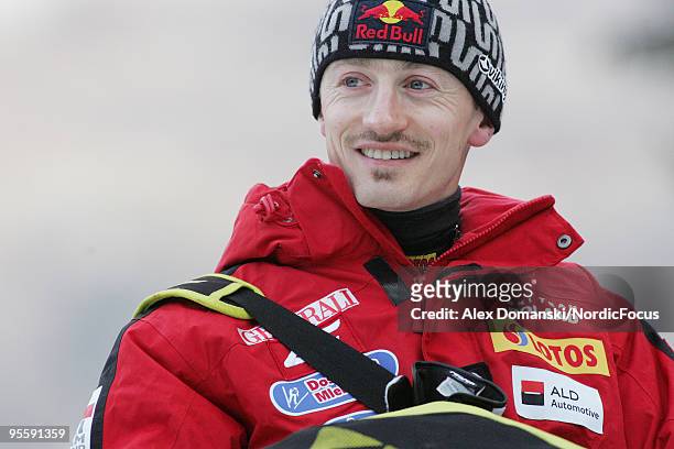 Adam Malysz of Poland looks on during the FIS Ski Jumping World Cup event of the 58th Four Hills Ski Jumping Tournament on January 05, 2010 in...