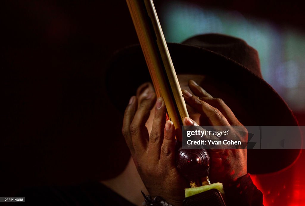 A member of Rasmee Wayrana's band playing a traditional...