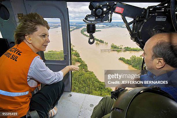 The governor of the state of Rio Grande do Sul, Yeda Crusuis and the mayor of the City of Santa Maria, Cezar Schirmer, overfly aboard a helicopter...