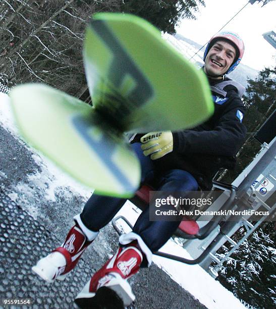 Andreas Kofler of Austria rides up the hill on a chairlift during the FIS Ski Jumping World Cup event of the 58th Four Hills Ski Jumping Tournament...