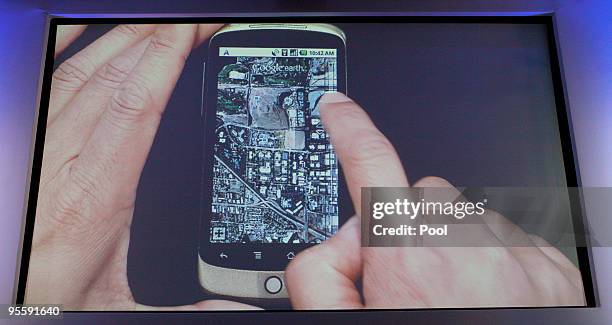 Screen shot of the Google Earth application on Google's Nexus One smartphone is displayed on a screen during the unveiling at Google's headquarters...