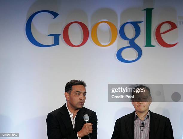 Dr. Sanjay Jha , CEO of Motorola, talks as Peter Chou, CEO of HTC, listens during the question and answer period after the unveiling of Google's...