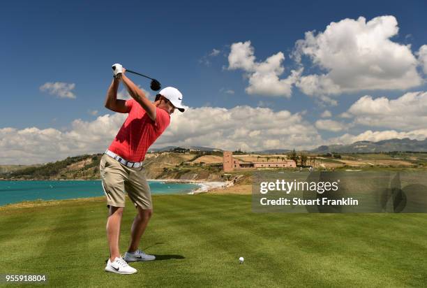 Adrien Saddier of France plays a shot during practice prior to the start of The Rocco Forte Open at the Verdura golf resort on May 8, 2018 in...