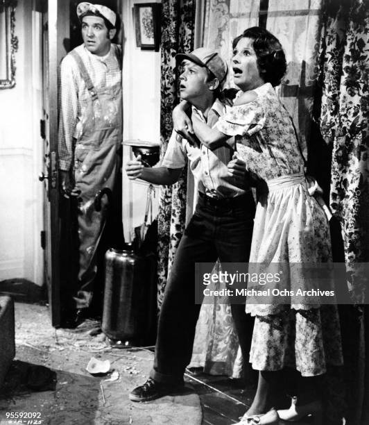 Actors George Lindsey, Vince Van Patten and Cloris Leachman look on as Fred MacMurray tussles with a gangster in a scene from the comedy-fantasy...
