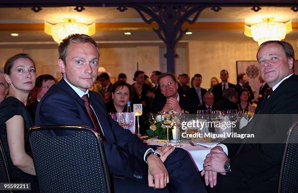 Christian Lindner, new secretary general of Germany's Free Democratic Party and his predecessor German Development Minister Dirk Niebel attend the...