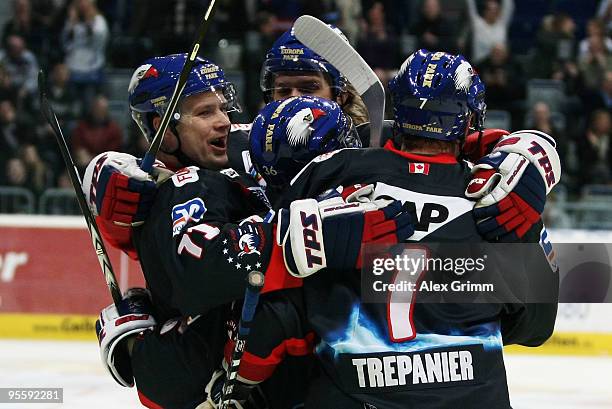 Yannic Seidenberg celebrates his team's fourth goal with team mates during the DEL match between Adler Mannheim and ERC Ingolstadt at the SAP Arena...