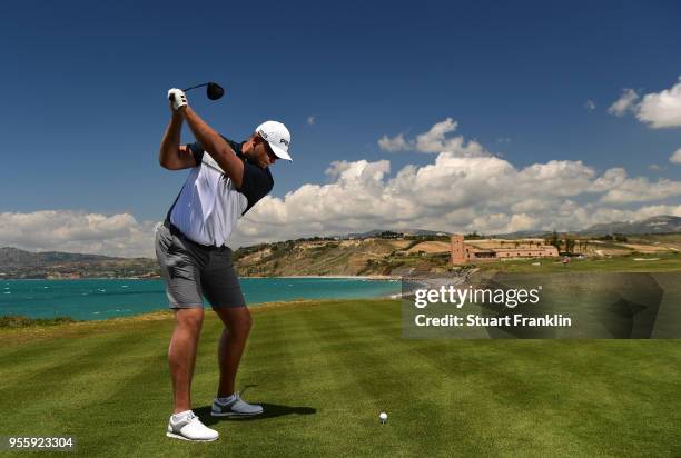 Jonathan Thomson of England plays a shot during practice prior to the start of The Rocco Forte Open at the Verdura golf resort on May 8, 2018 in...