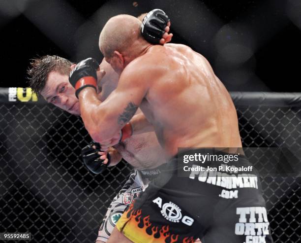 Fighter Forrest Griffin battles Tito Ortiz during their Light Heavyweight Fight at UFC 106: Ortiz vs. Griffin 2 at Mandalay Bay Events Center on...