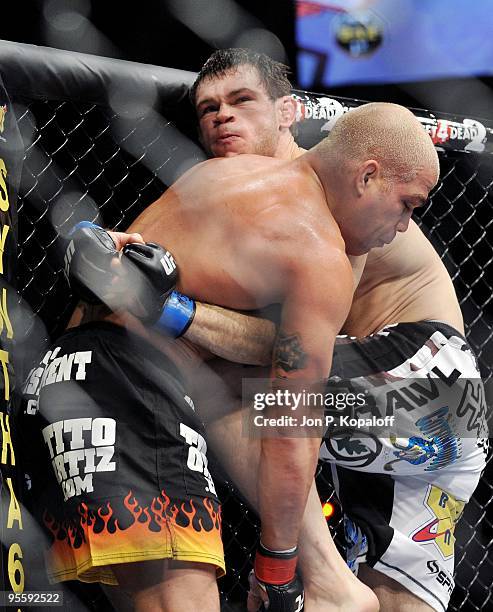 Fighter Tito Ortiz battles Forrest Griffin during their Light Heavyweight Fight at UFC 106: Ortiz vs. Griffin 2 at Mandalay Bay Events Center on...