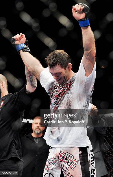 Fighter Forrest Griffin celebrates after defeating UFC fighter Tito Ortiz during their Light Heavyweight Fight at UFC 106: Ortiz vs. Griffin 2 at...