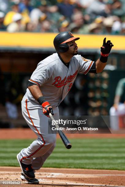 Pedro Alvarez of the Baltimore Orioles hits a home run against the Oakland Athletics during the second inning at the Oakland Coliseum on May 6, 2018...